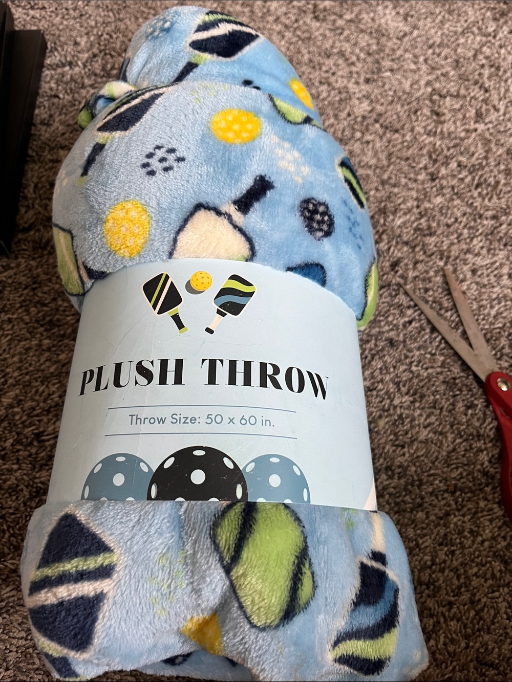 Plush Throw Blanket in Light Blue with pickleball. Polyester. New. 50x60. New.